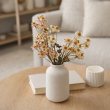 Load image into Gallery viewer, Artificial dried daisy stems styled in neutral ceramic vase on coffee table for home décor
